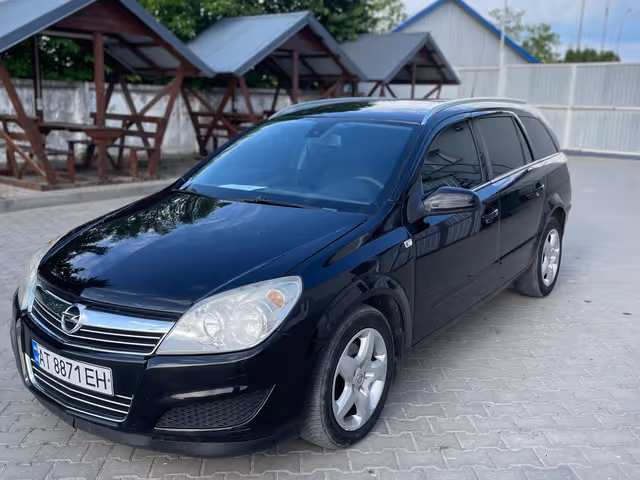 Opel Astra - фото 1