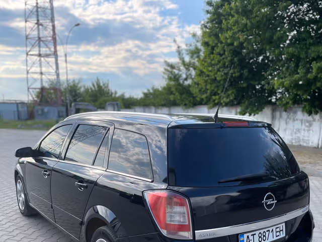 Opel Astra - фото 2