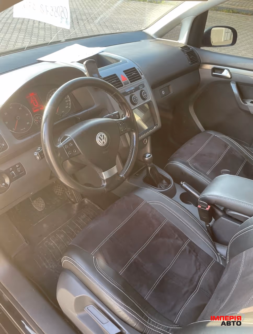 Volkswagen Touran - фото 6