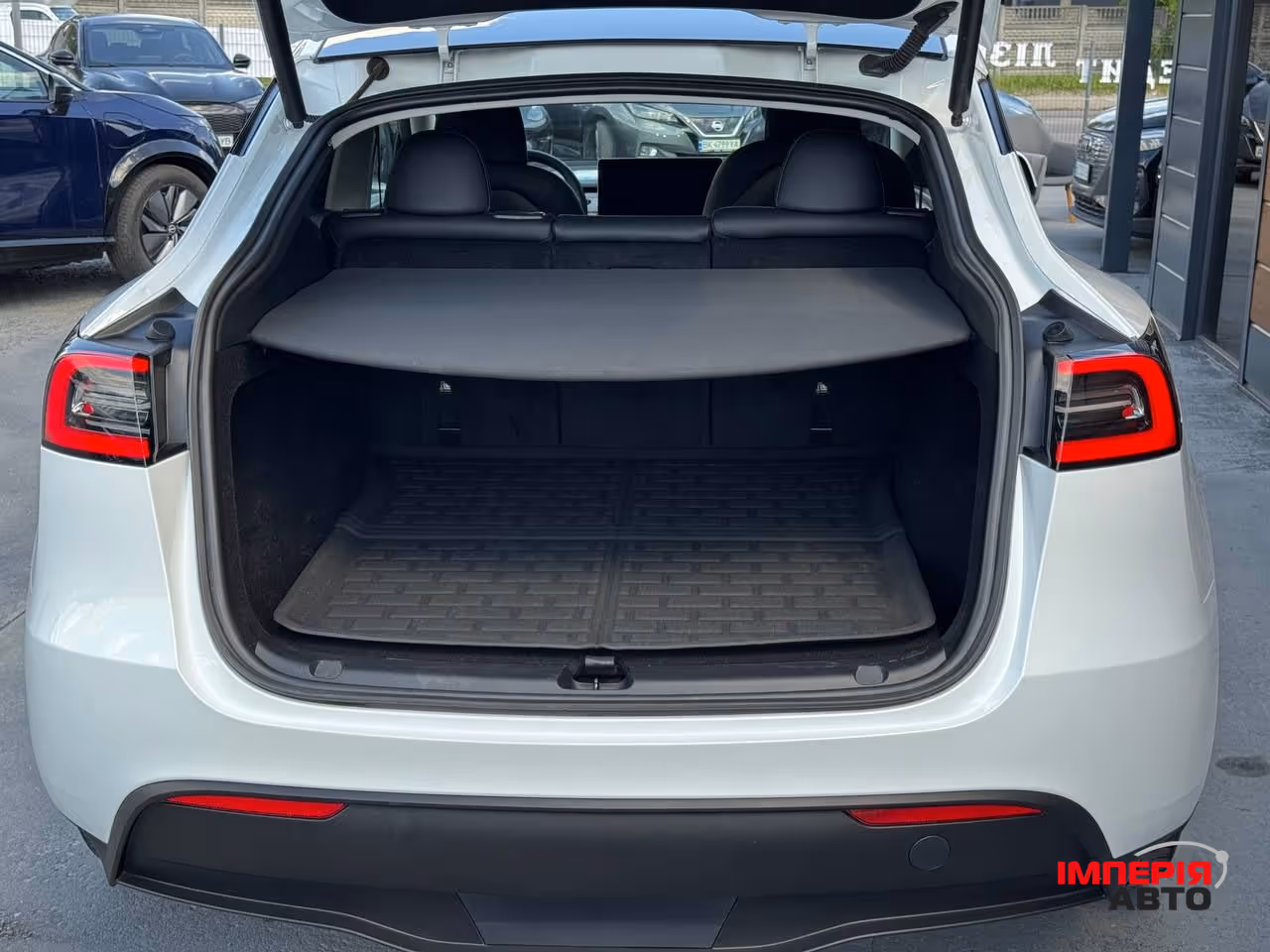 Tesla Model Y - фото 24