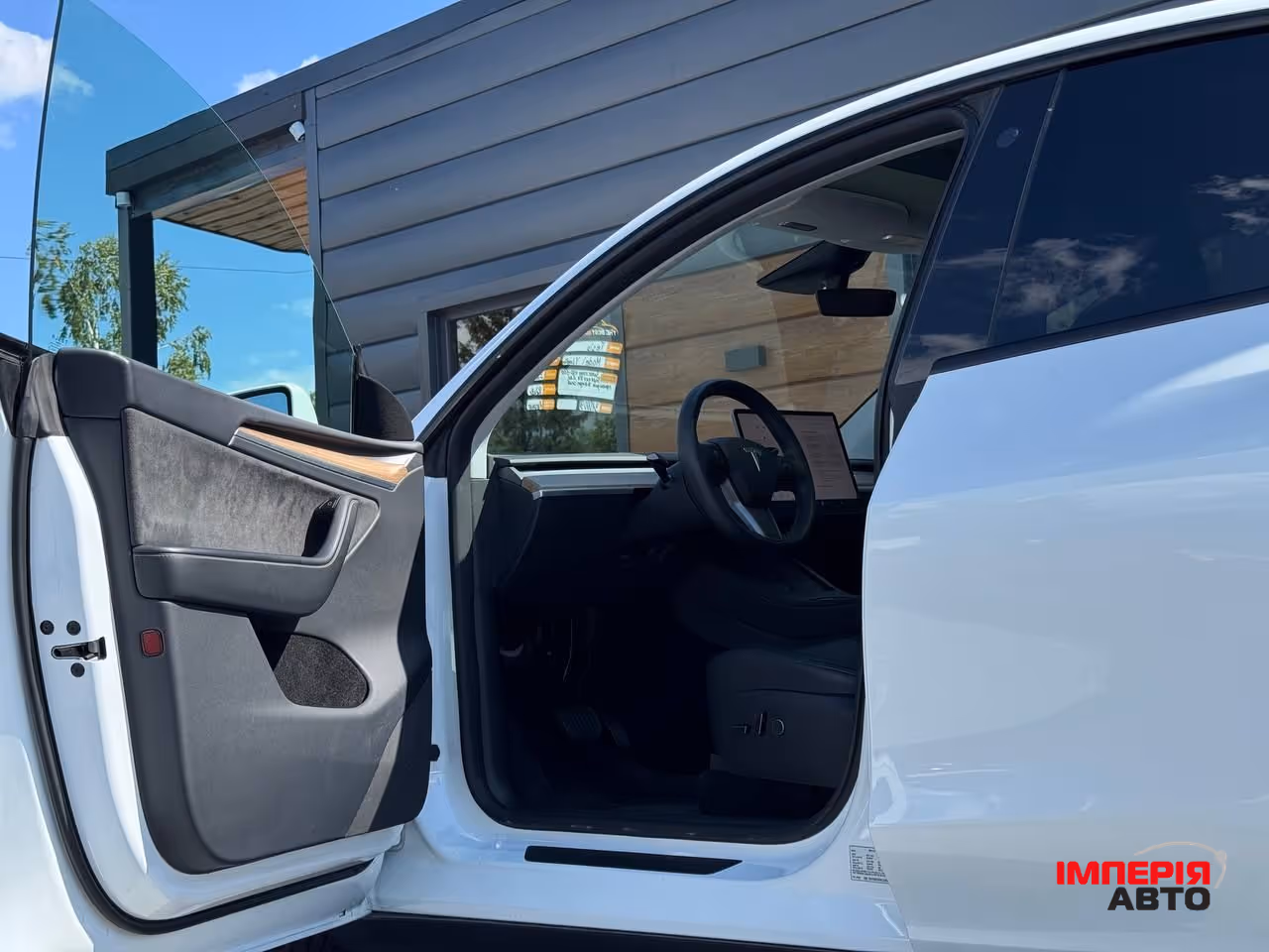 Tesla Model Y - фото 27