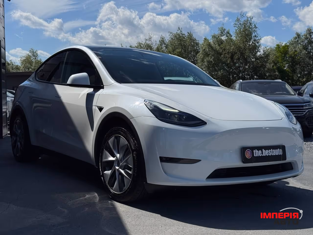 Tesla Model Y - фото 10