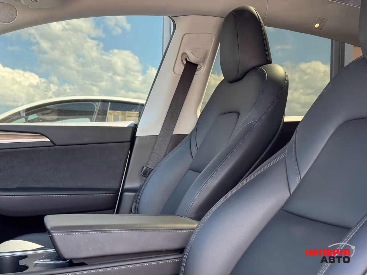 Tesla Model Y - фото 36