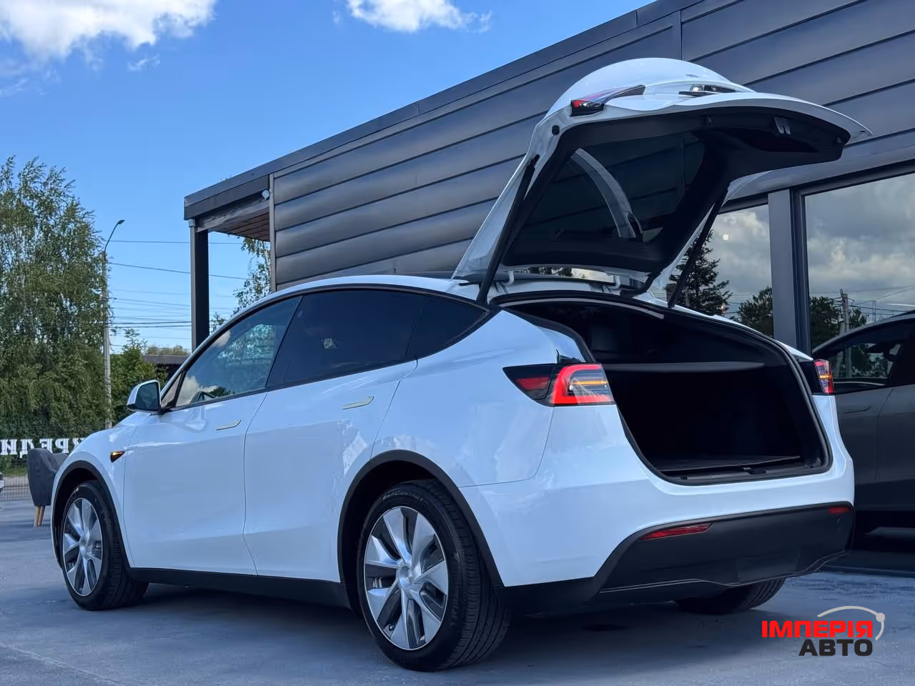 Tesla Model Y - фото 26