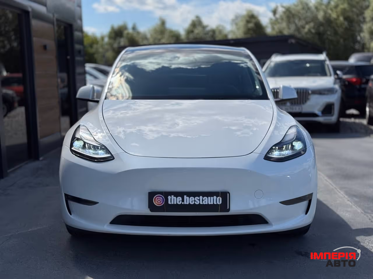 Tesla Model Y - фото 14