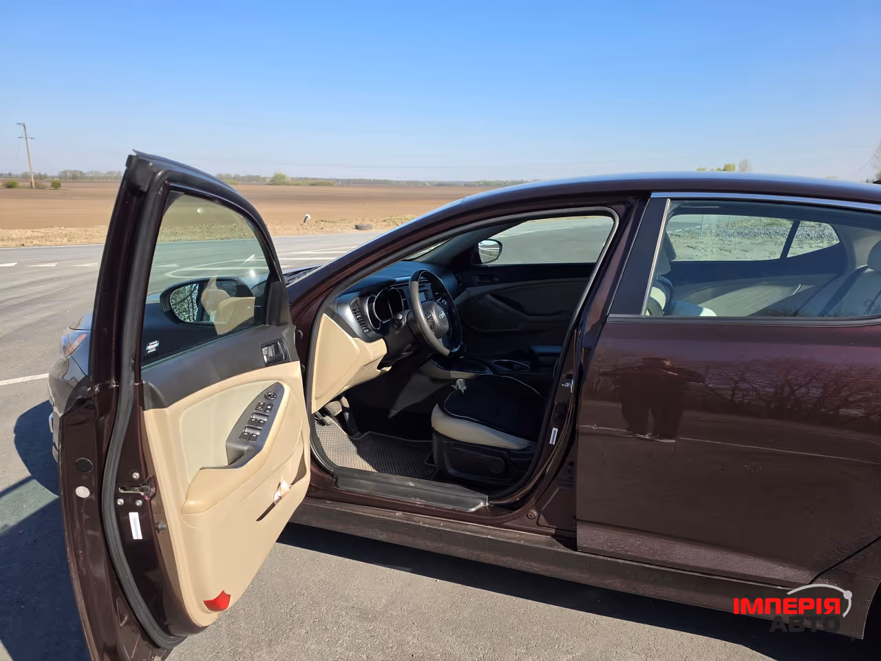 Kia Optima - фото 5