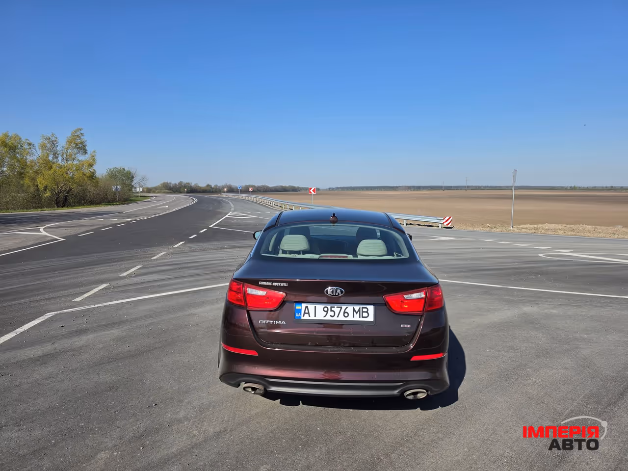 Kia Optima - фото 7