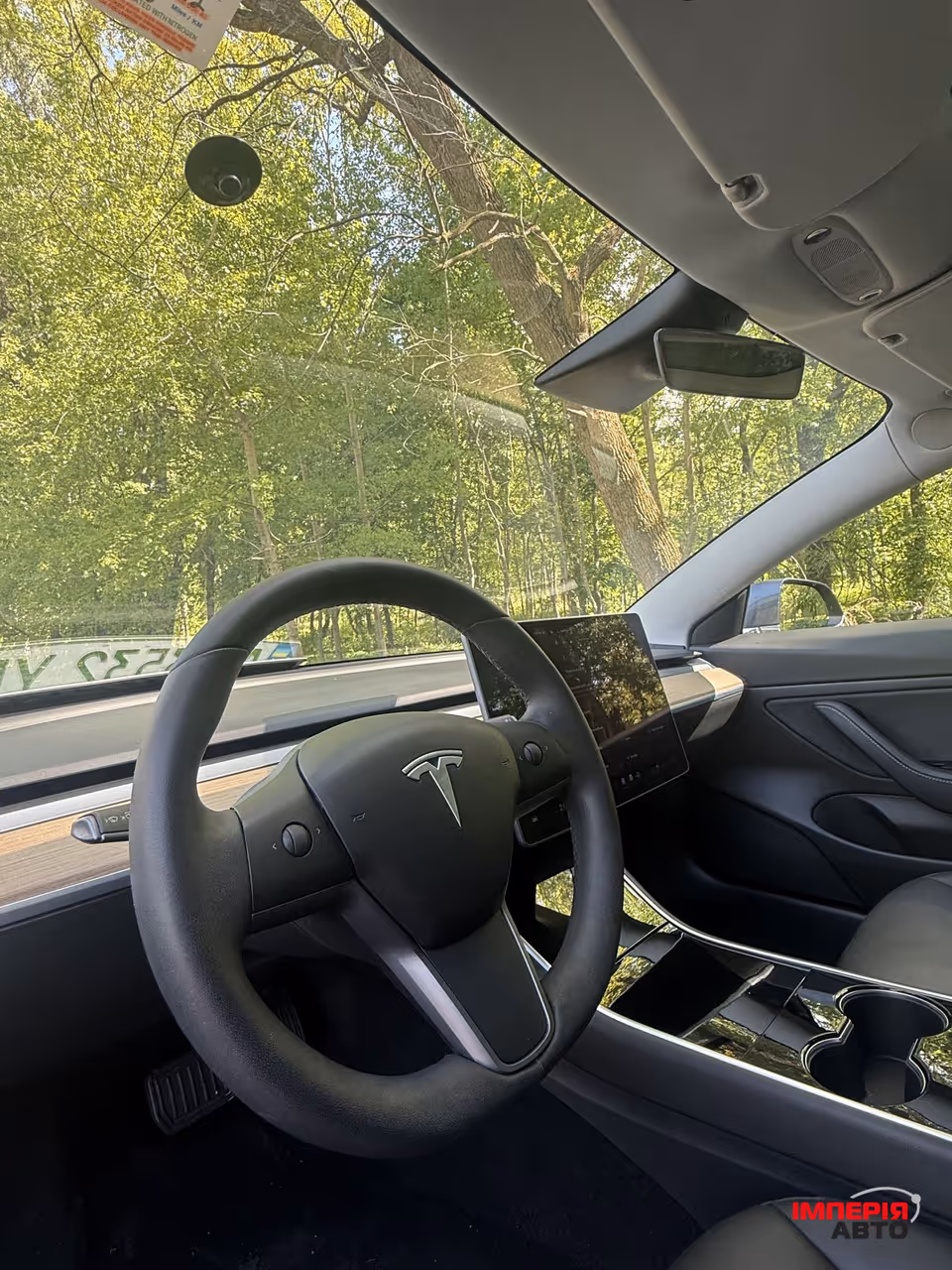 Tesla Model 3 - фото 12
