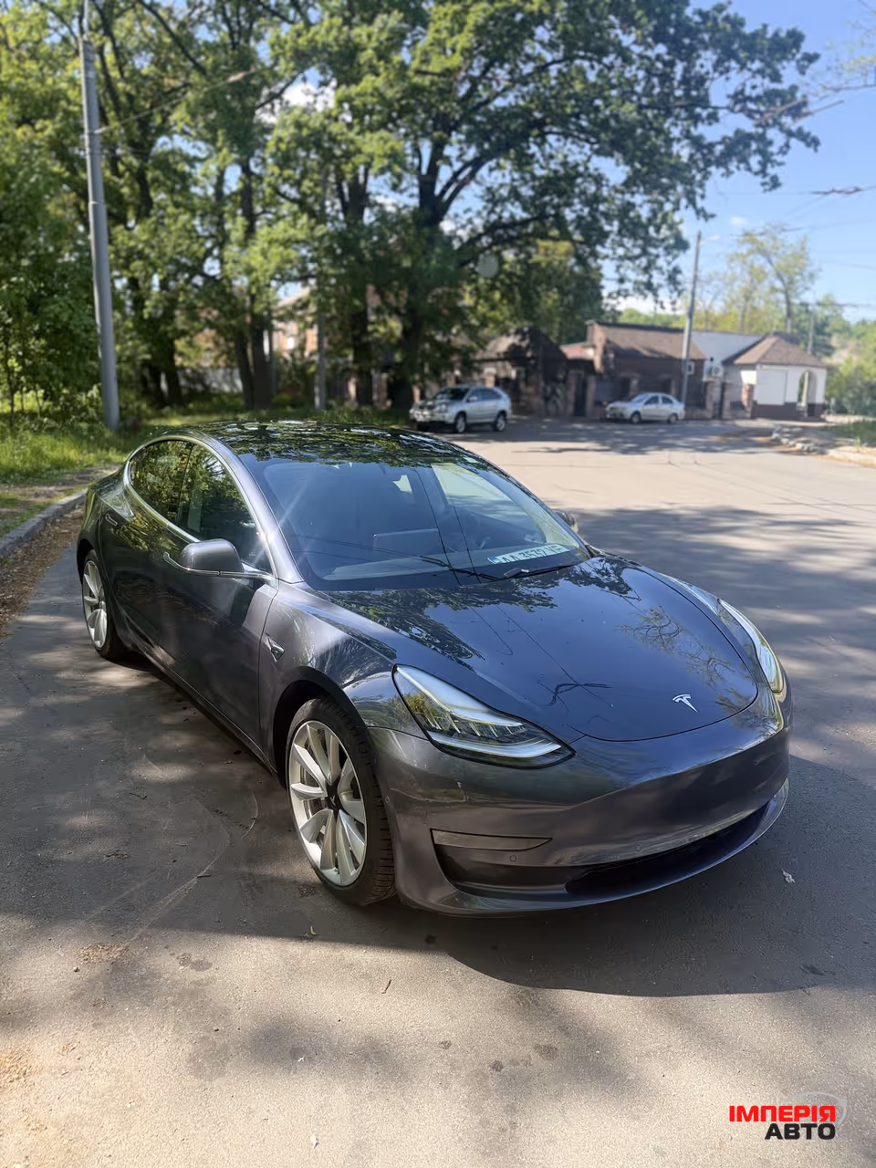 Tesla Model 3 - фото 1