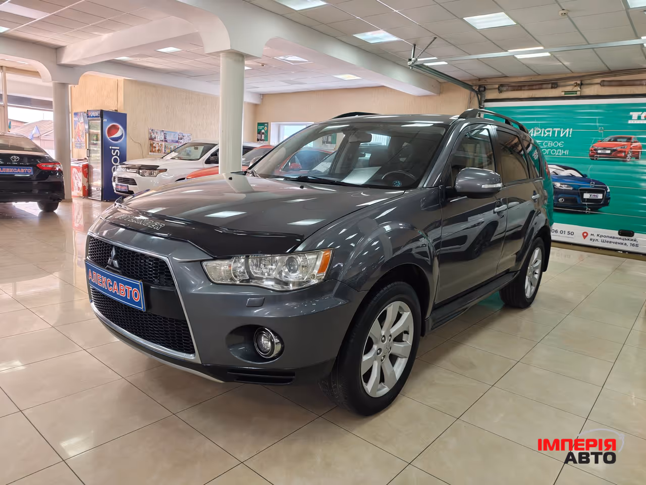 Mitsubishi Outlander - фото 1