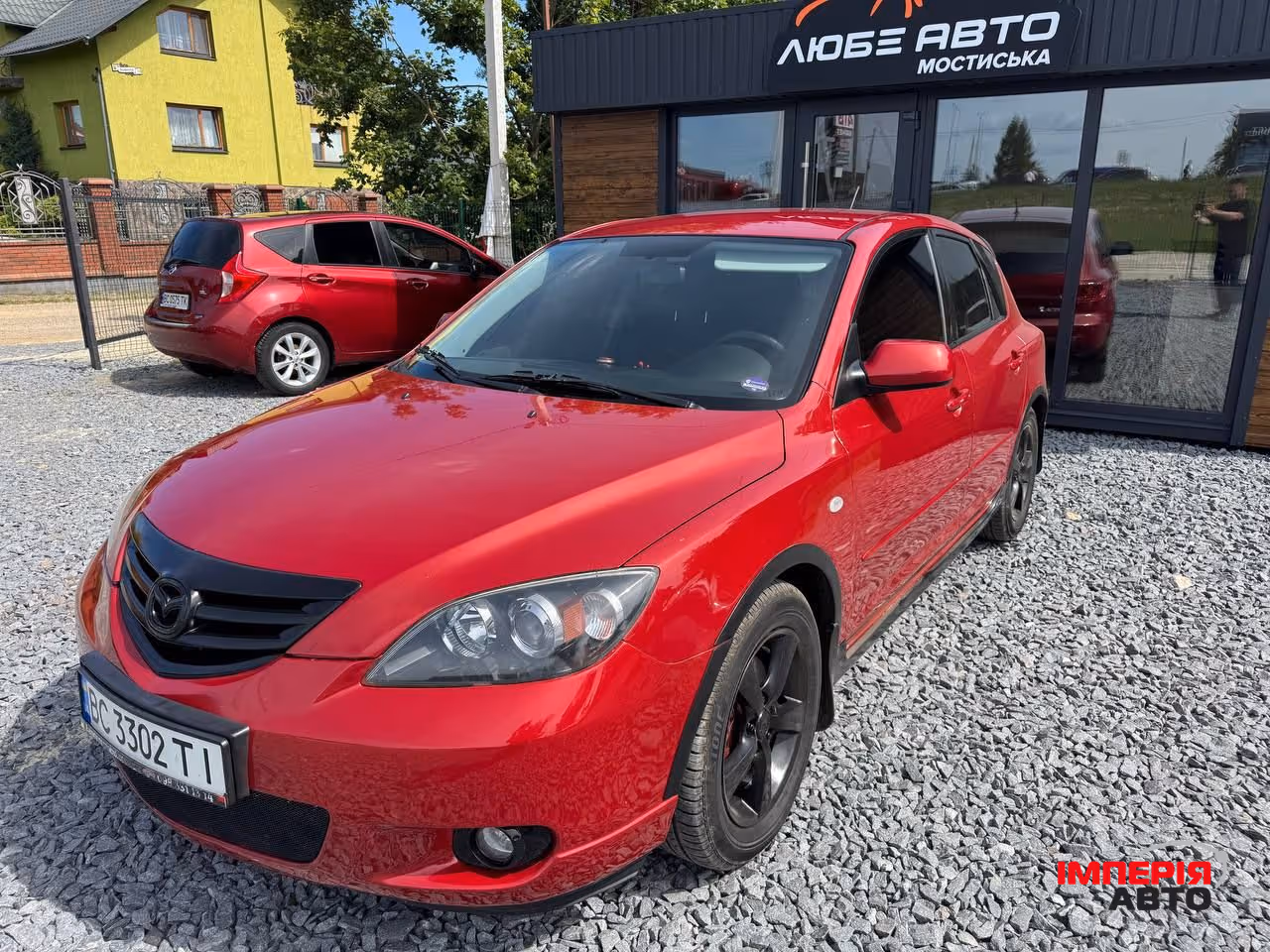 Mazda 3 - фото 11