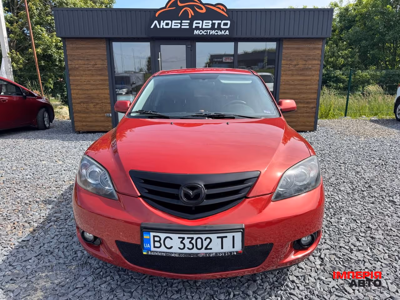 Mazda 3 - фото 12