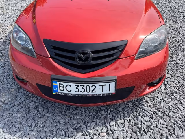 Mazda 3 - фото 1