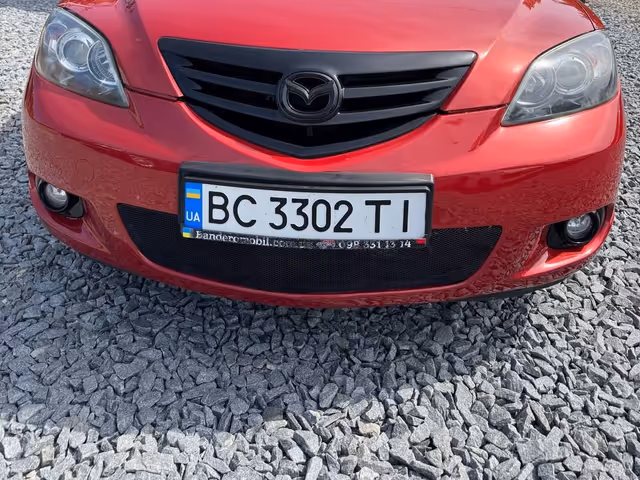 Mazda 3 - фото 2