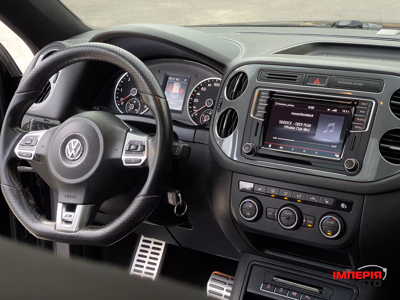 Volkswagen Tiguan - фото 11