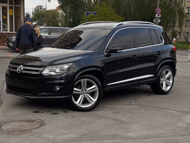 Volkswagen Tiguan - фото 1