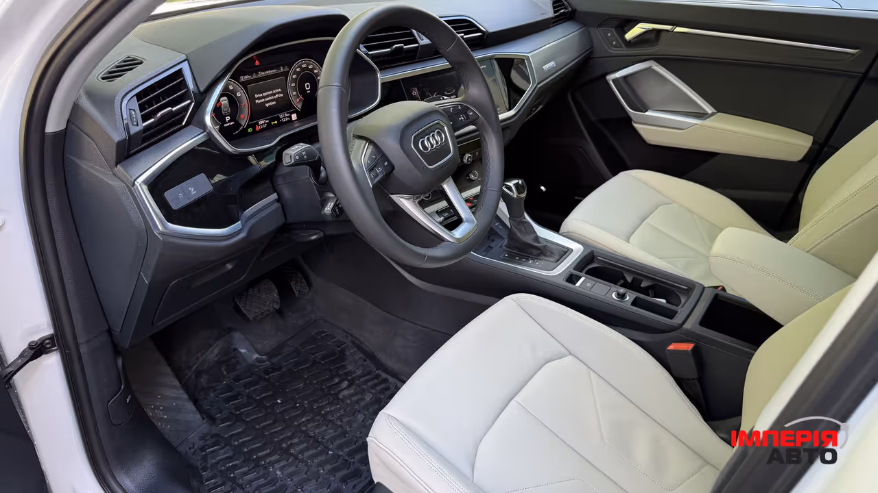 Audi Q3 - фото 16