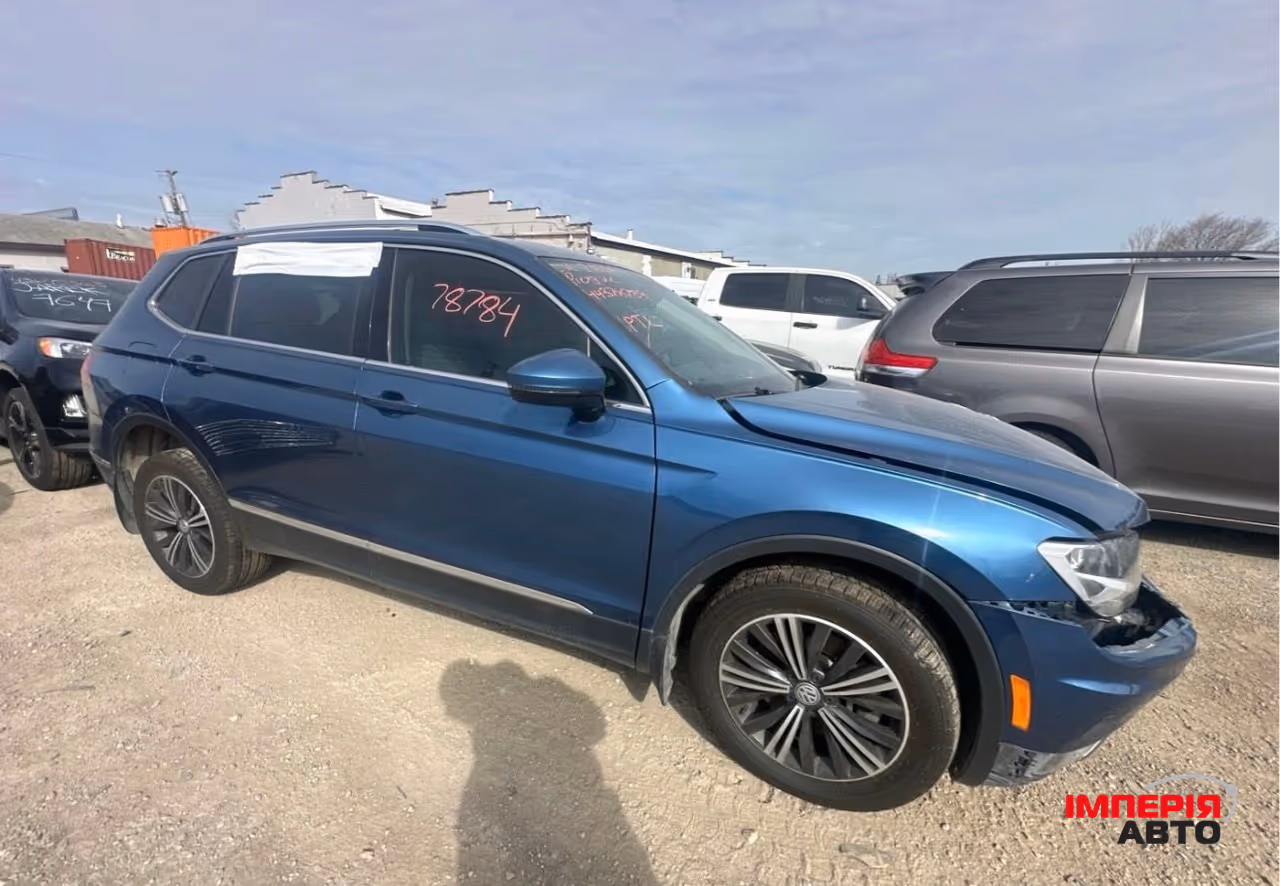 Volkswagen Tiguan - фото 5