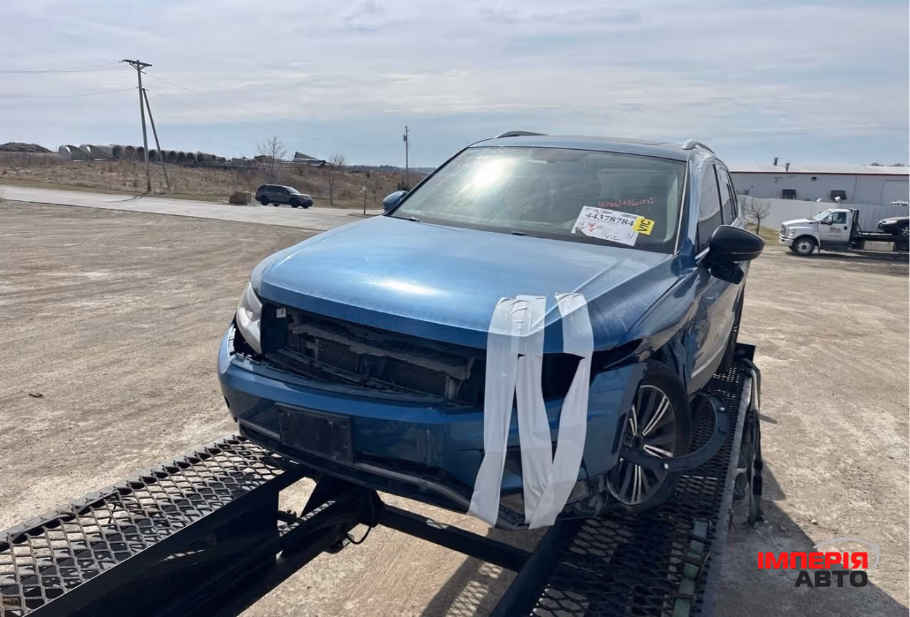 Volkswagen Tiguan - фото 1