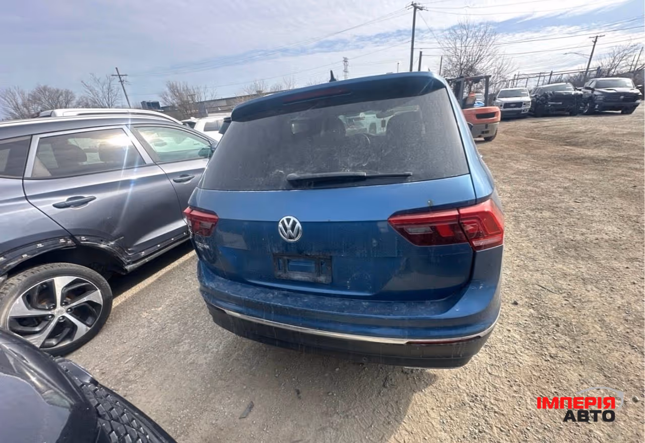 Volkswagen Tiguan - фото 6