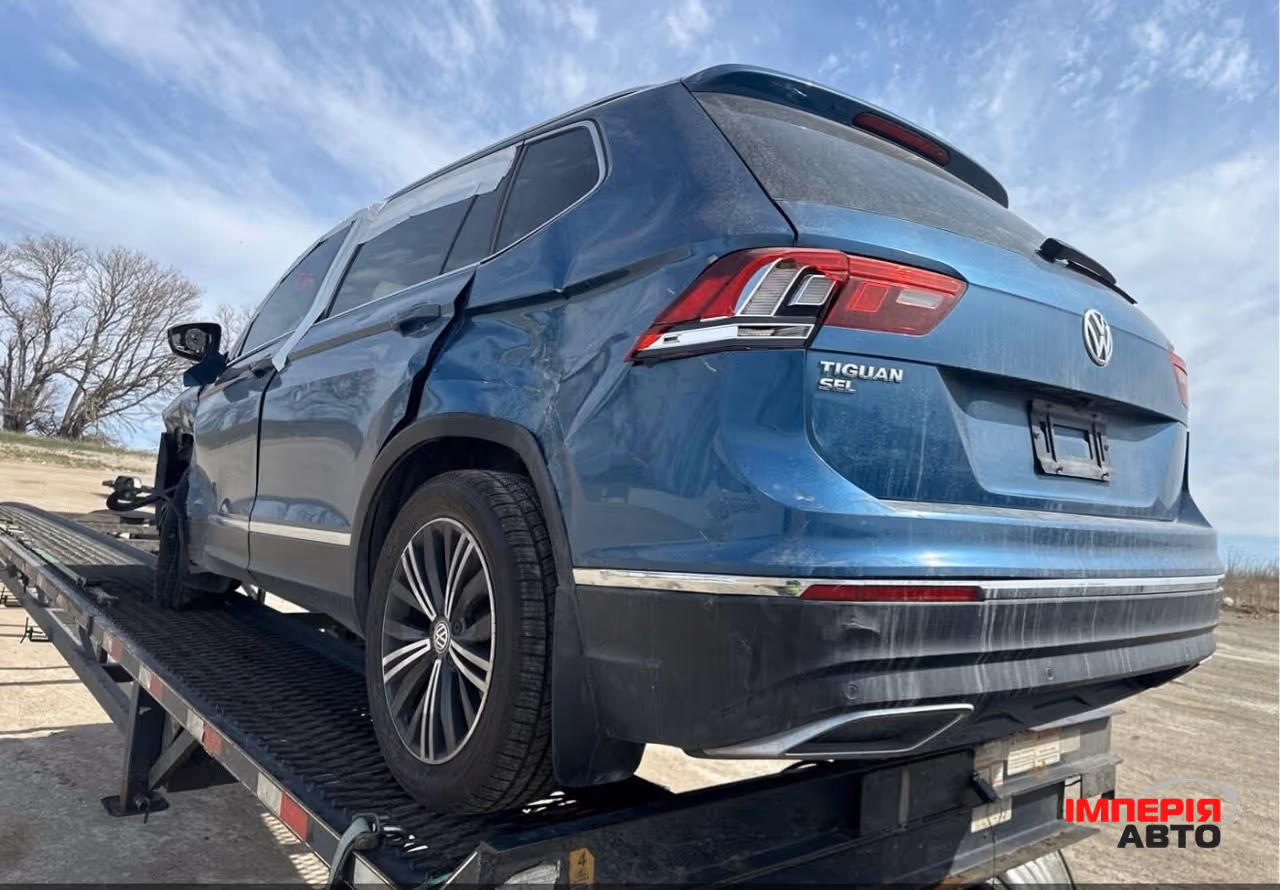 Volkswagen Tiguan - фото 4