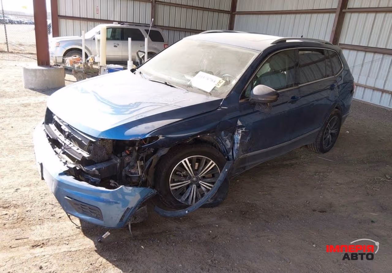Volkswagen Tiguan - фото 8