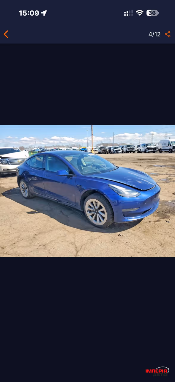 Tesla Model 3 - фото 1
