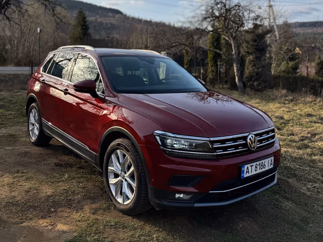 Volkswagen Tiguan - фото 1