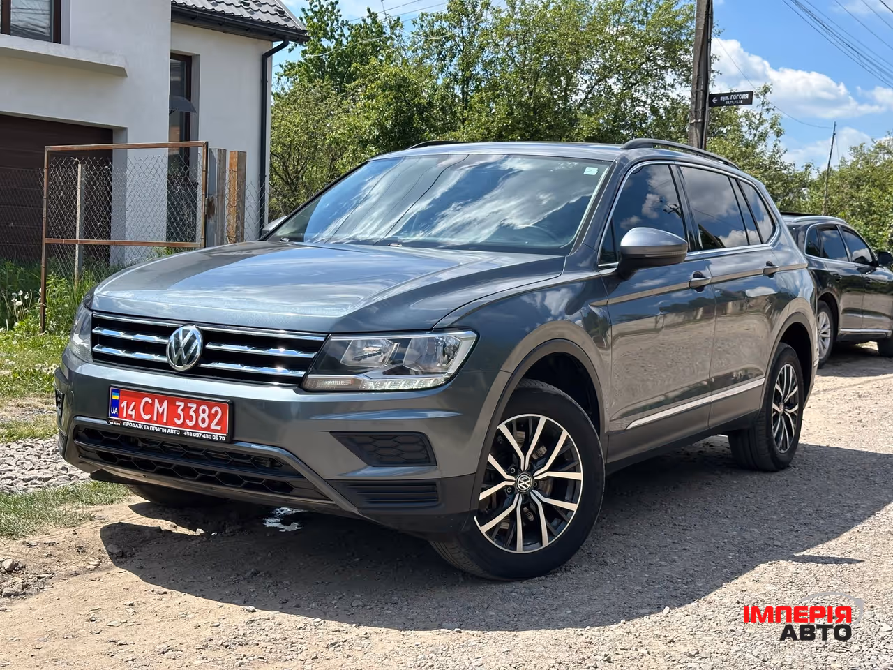 Volkswagen Tiguan - фото 1