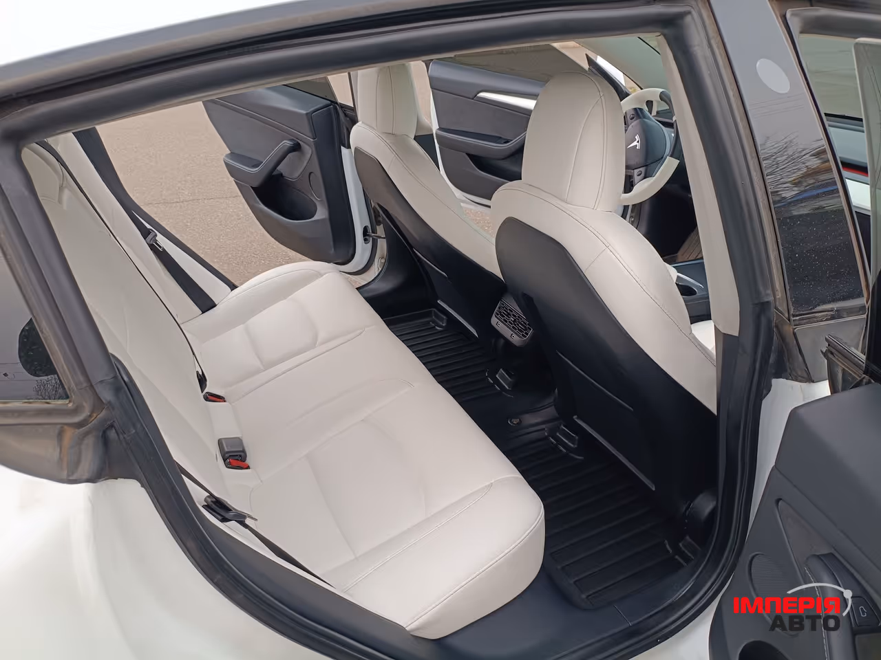 Tesla Model 3 - фото 14