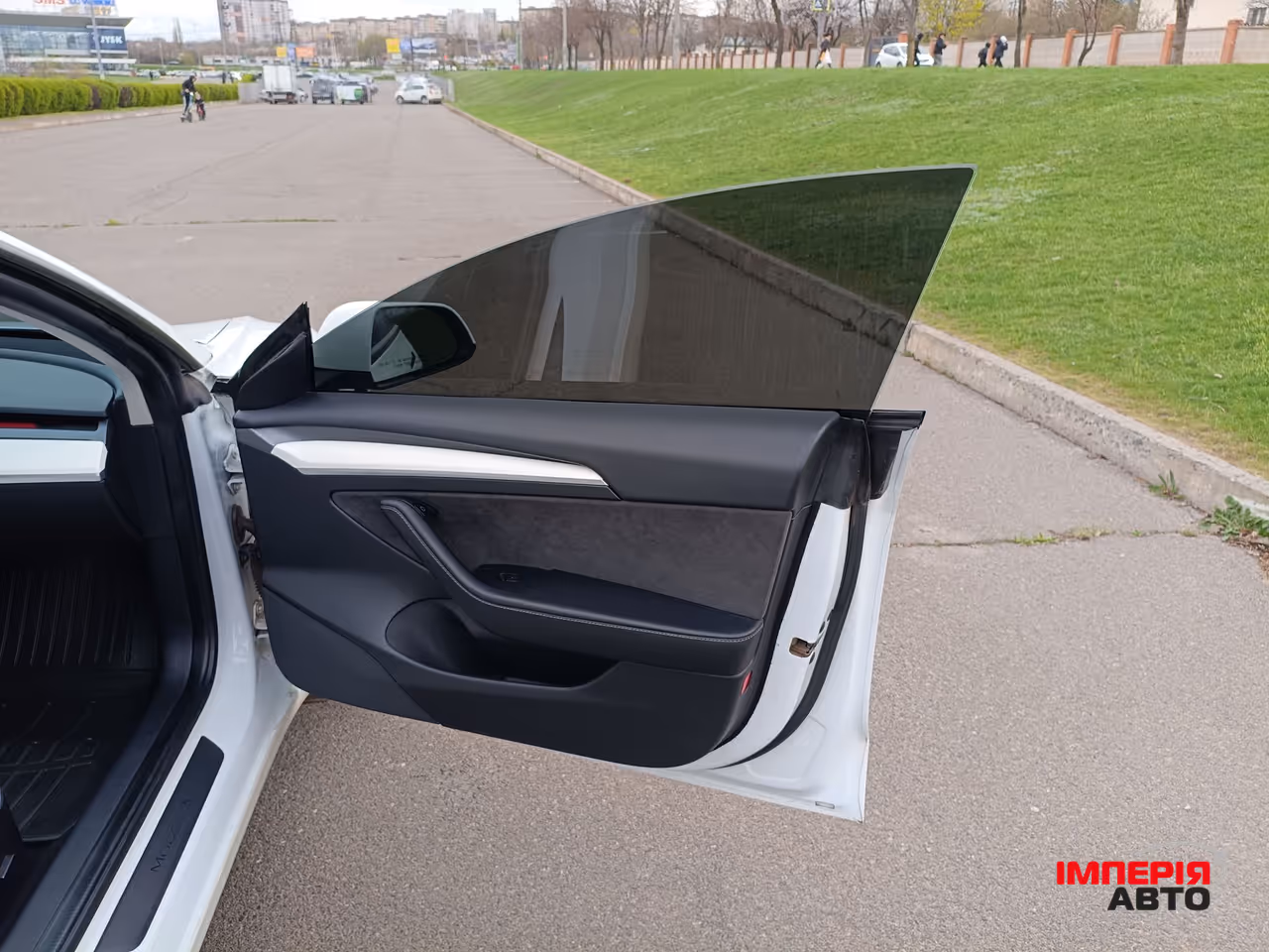 Tesla Model 3 - фото 17