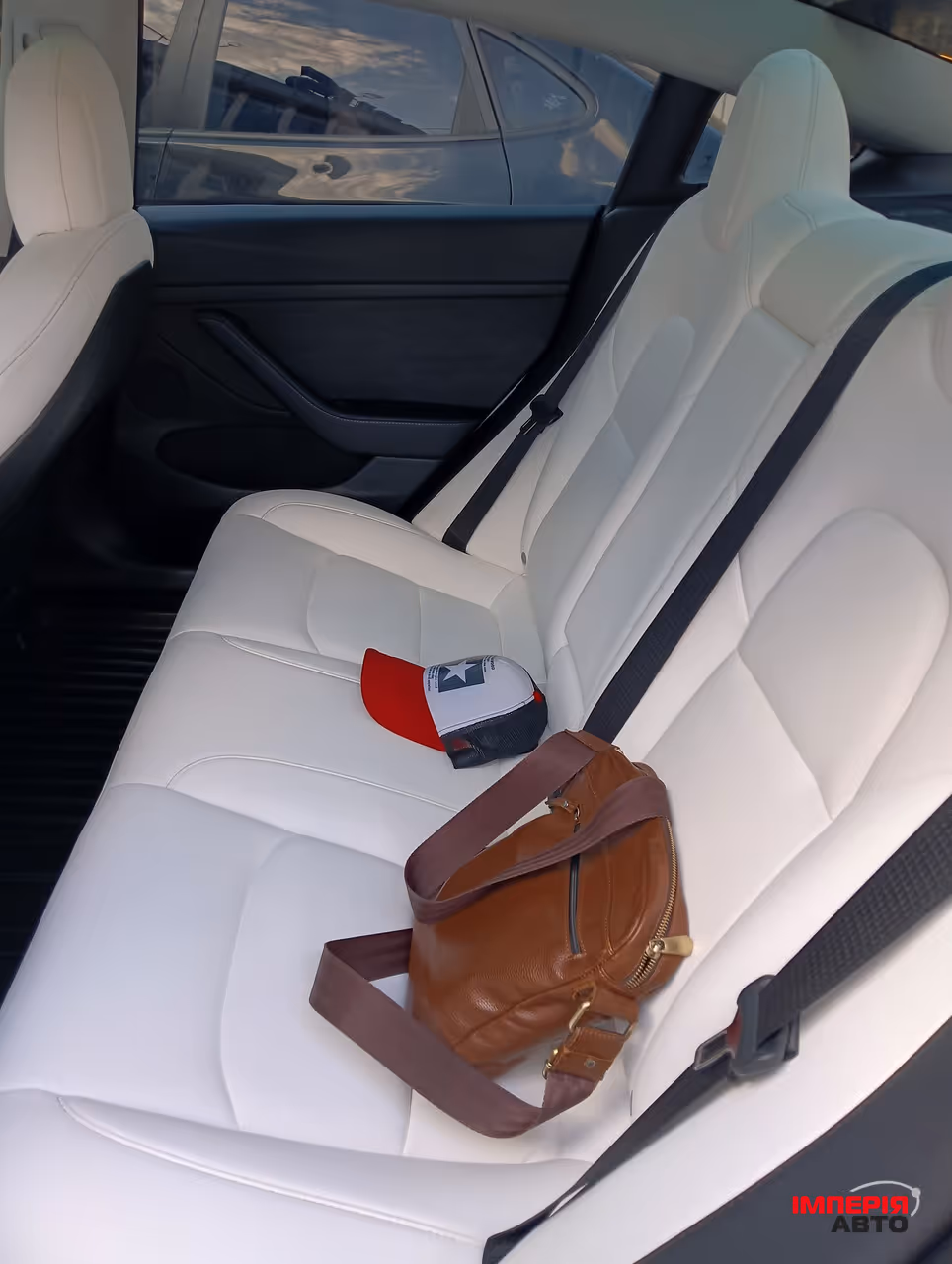 Tesla Model 3 - фото 32