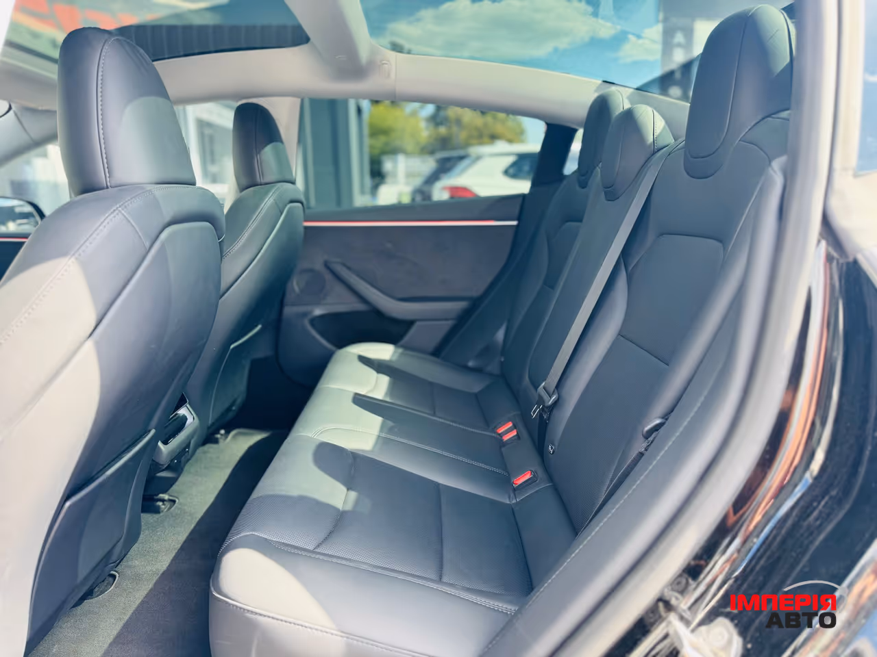 Tesla Model 3 - фото 8
