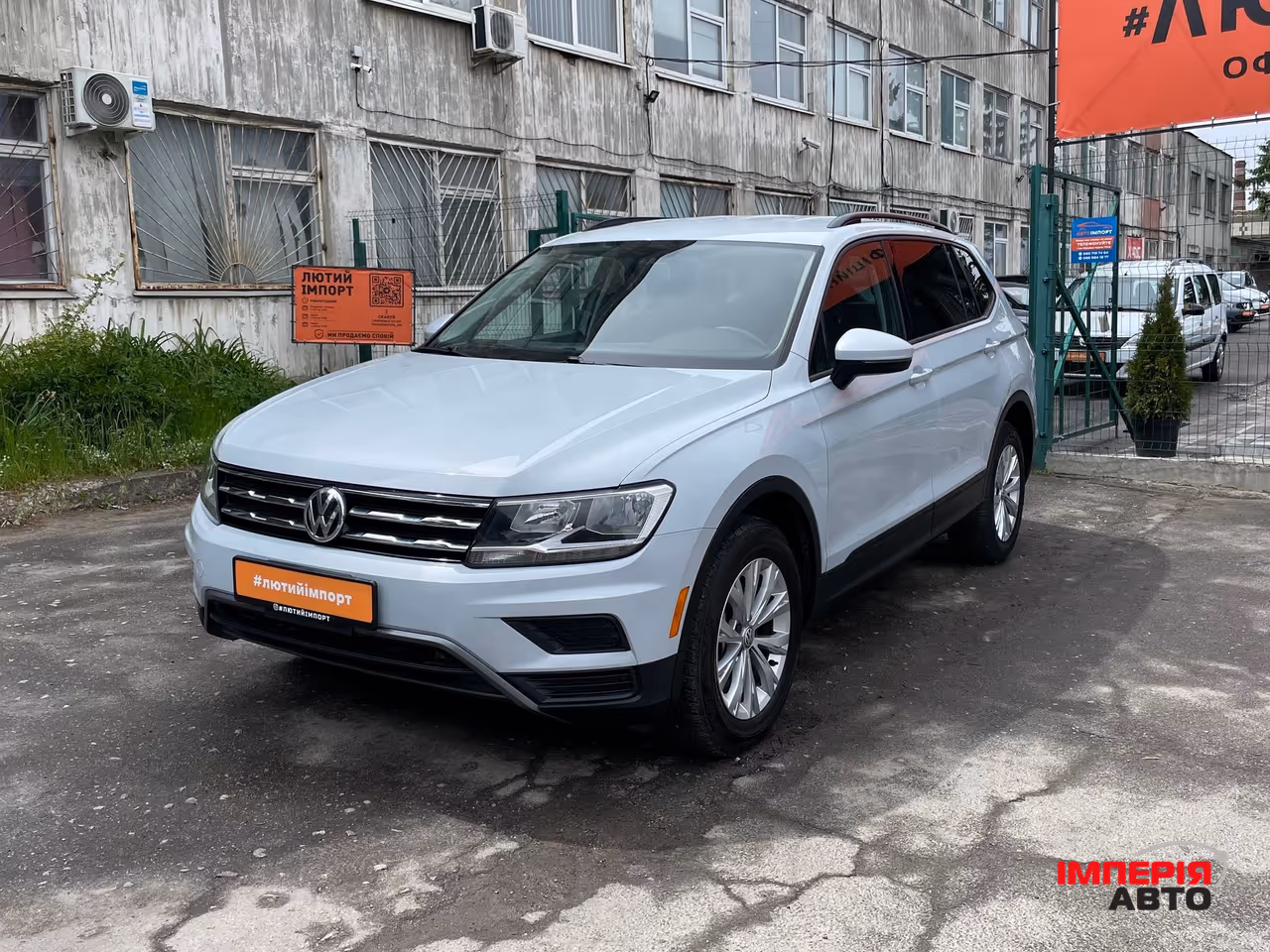Volkswagen Tiguan - фото 11