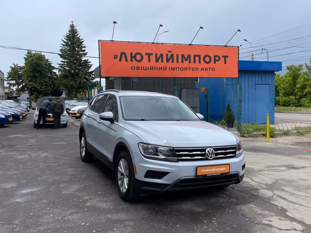 Volkswagen Tiguan - фото 1