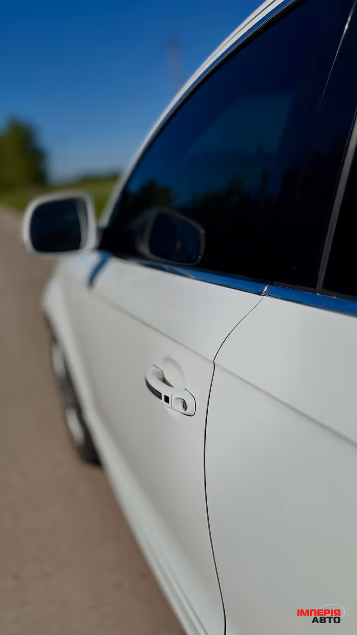 Audi Q7 - фото 9