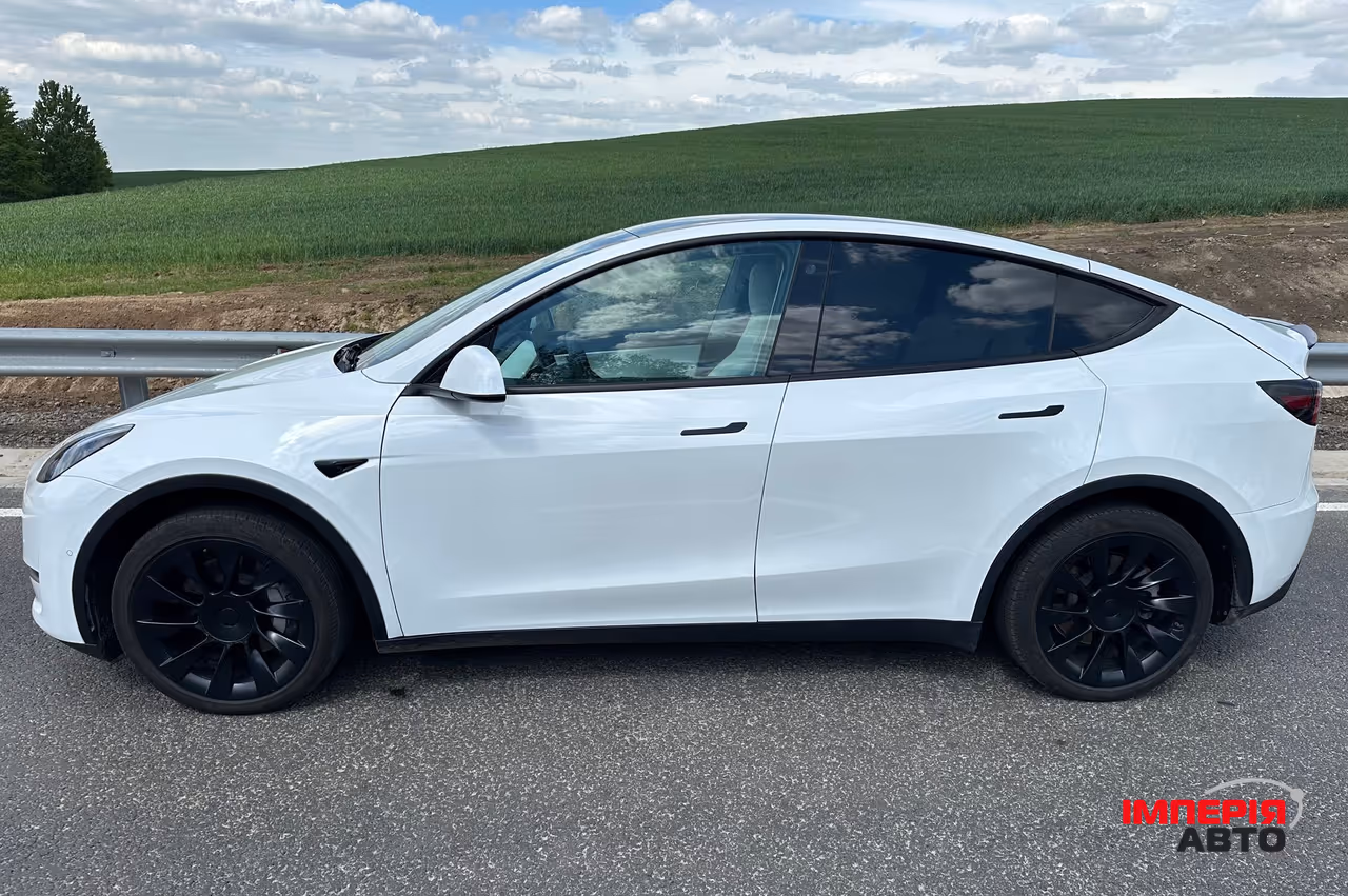 Tesla Model Y - фото 7