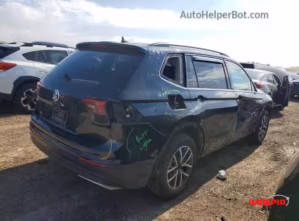 Volkswagen Tiguan - фото 2