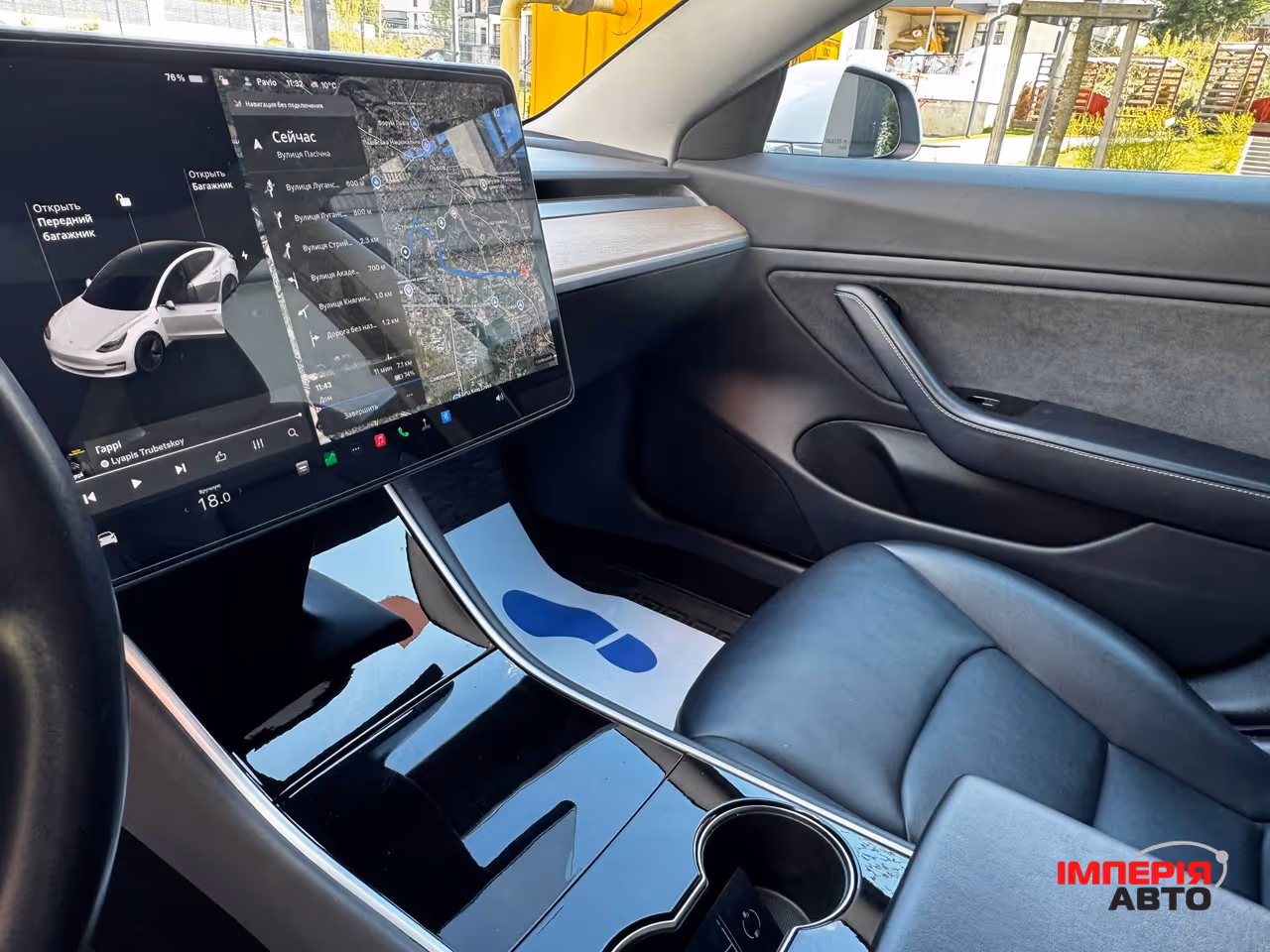 Tesla Model 3 - фото 12