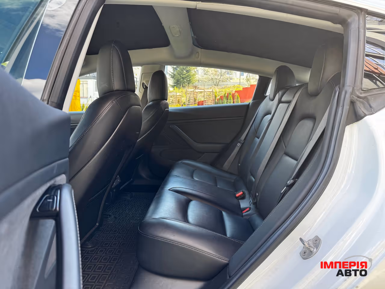 Tesla Model 3 - фото 13