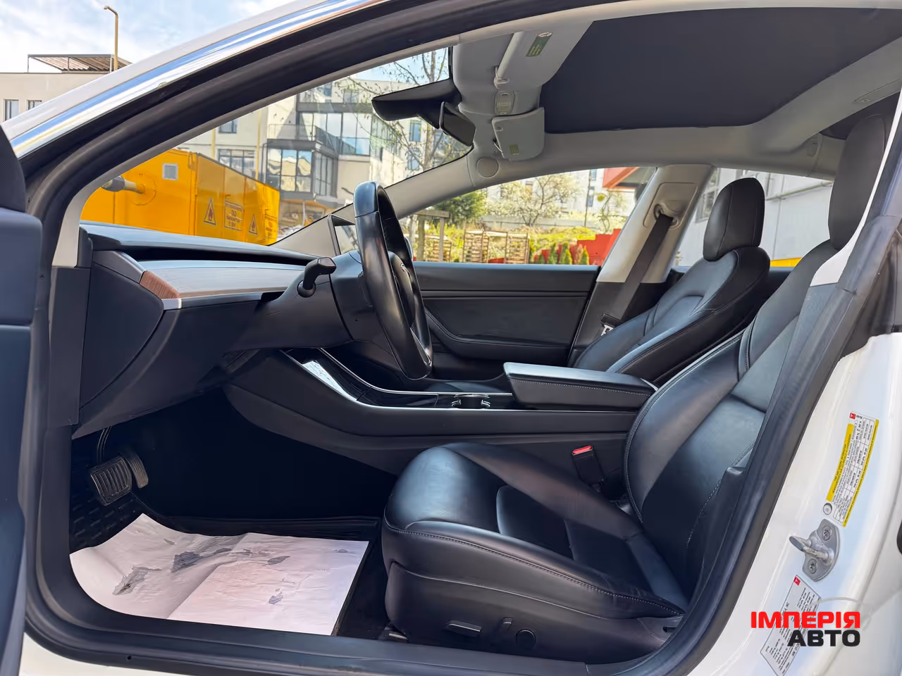 Tesla Model 3 - фото 10