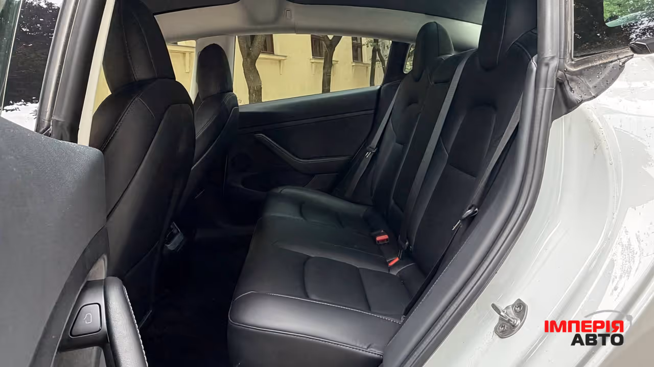Tesla Model 3 - фото 8