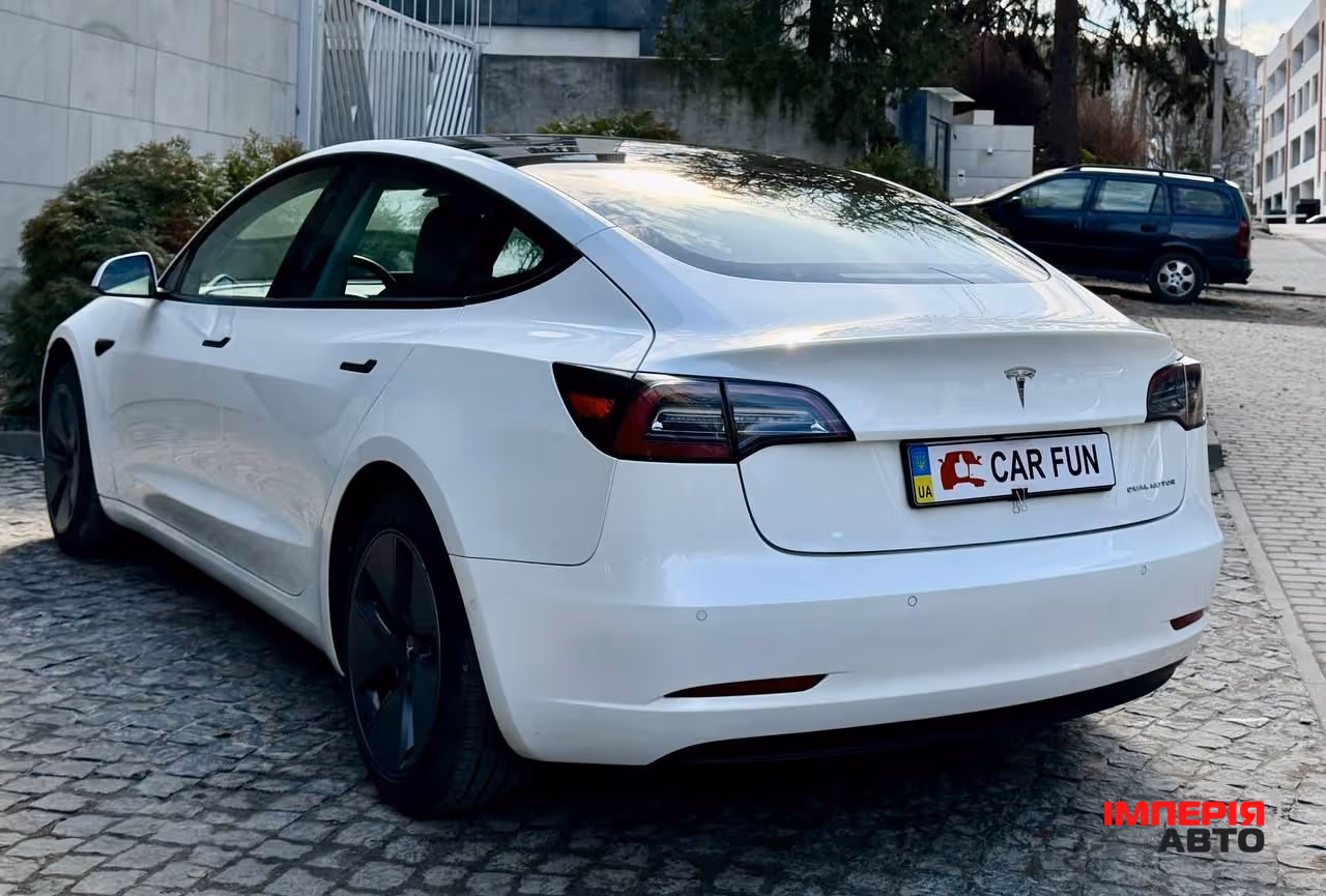 Tesla Model 3 - фото 7