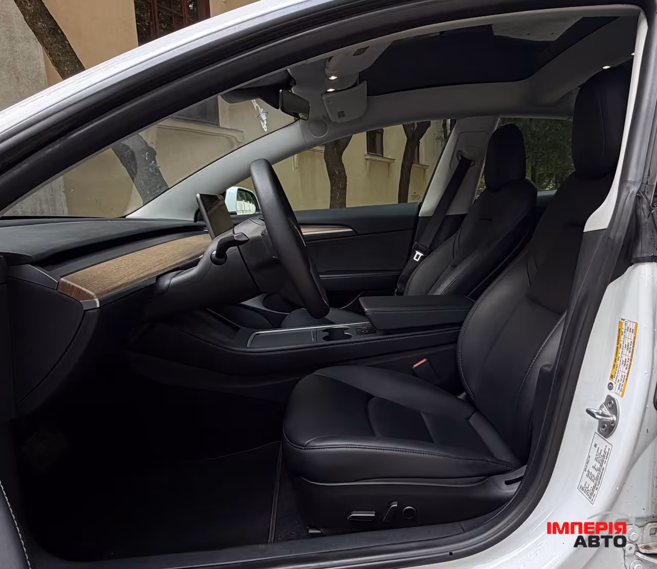 Tesla Model 3 - фото 7