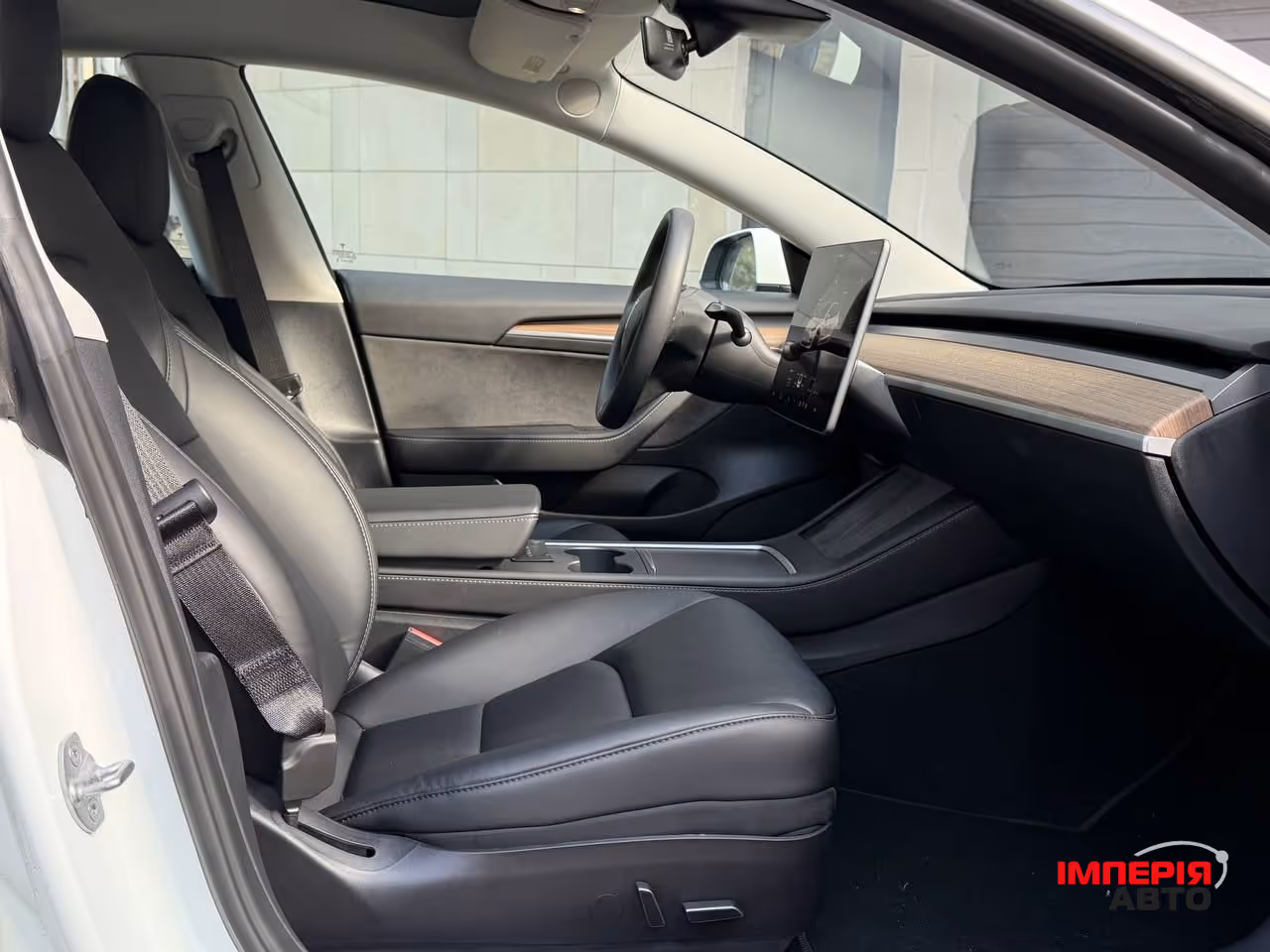 Tesla Model 3 - фото 10