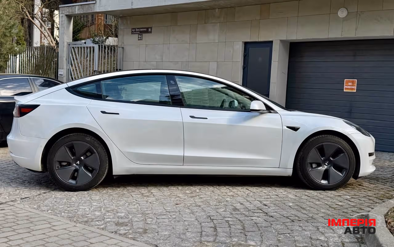 Tesla Model 3 - фото 8