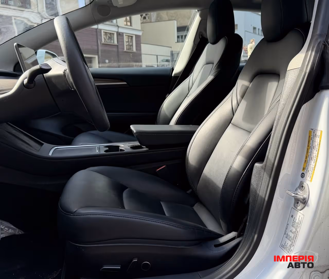 Tesla Model 3 - фото 19