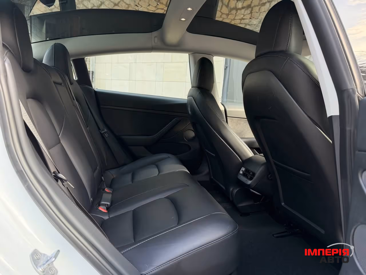 Tesla Model 3 - фото 12