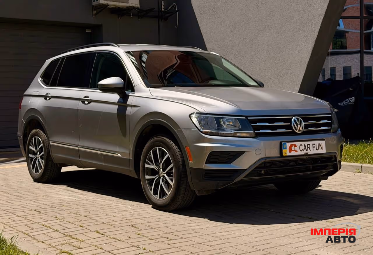Volkswagen Tiguan - фото 1