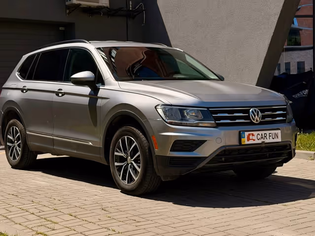 Volkswagen Tiguan - фото 1